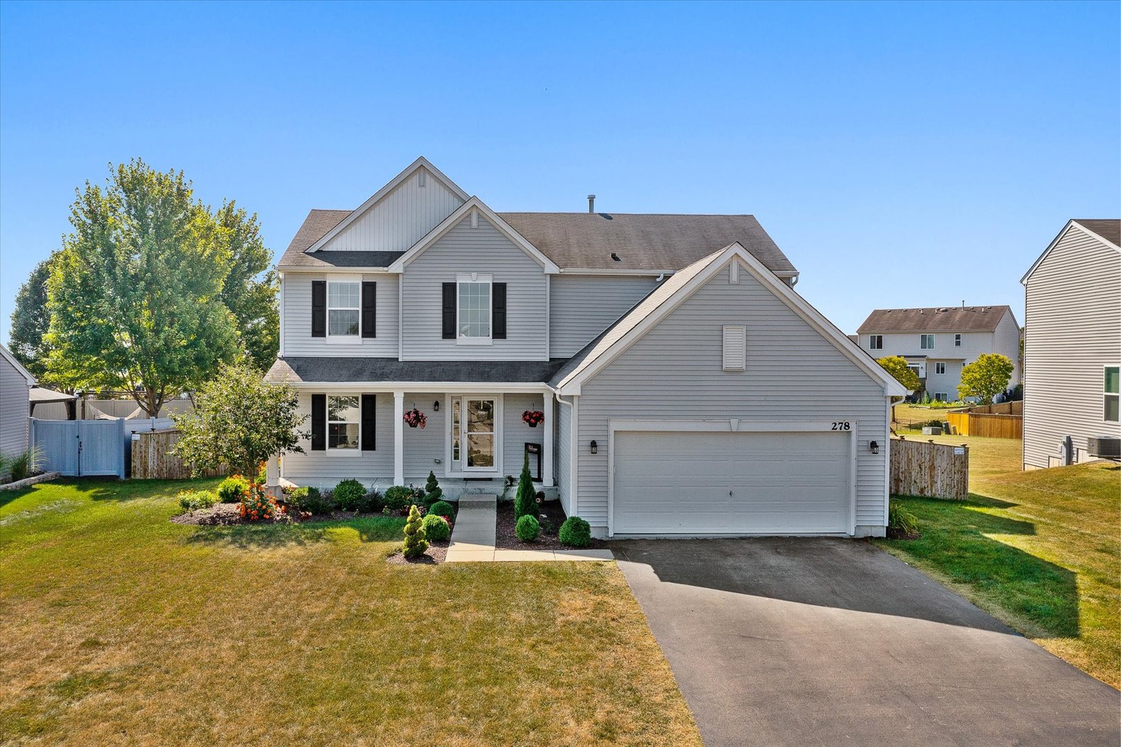 278 Windett Ridge Road Yorkville, IL 60560 - Photo 30 of 31 a view of a house with a yard