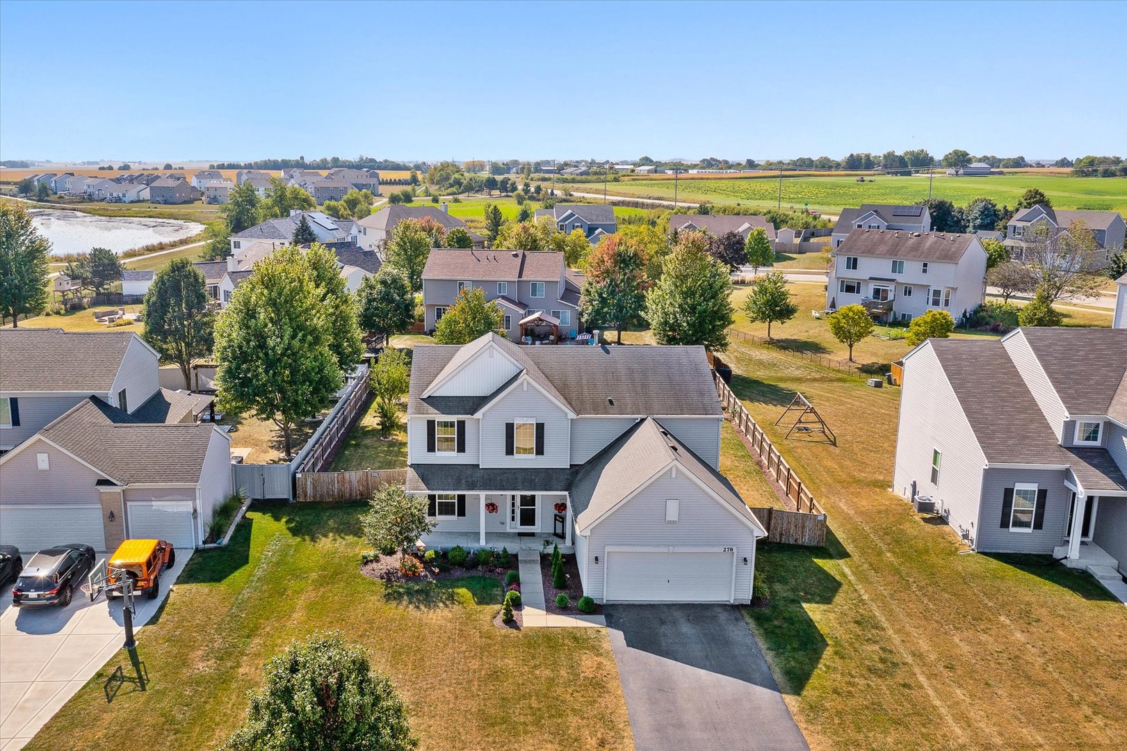 278 Windett Ridge Road Yorkville, IL 60560 - Photo 31 of 31 an aerial view of residential houses with outdoor space and ocean view