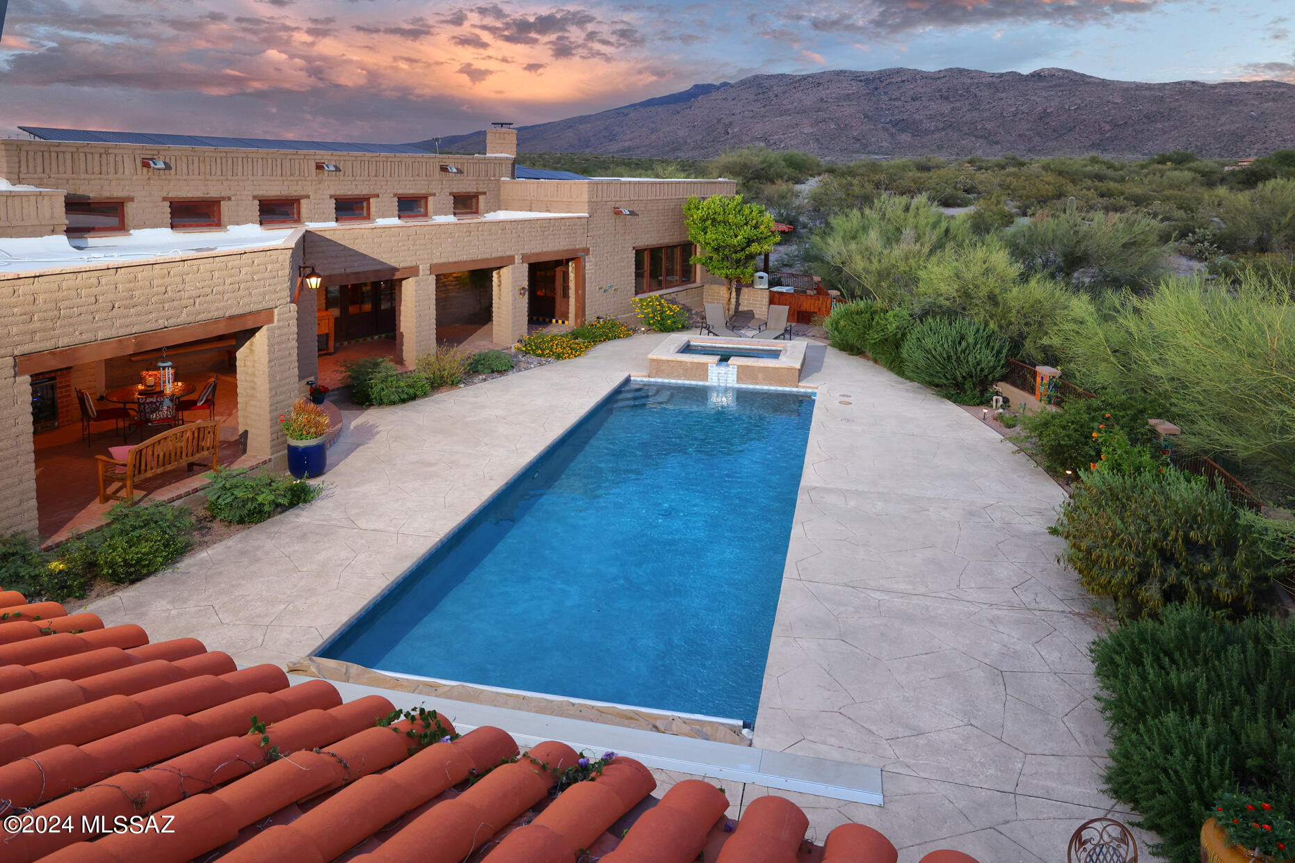 11725 East Spanish Ridge Place Tucson, AZ 85730 - Photo 7 of 51 a view of house with outdoor space and sitting area