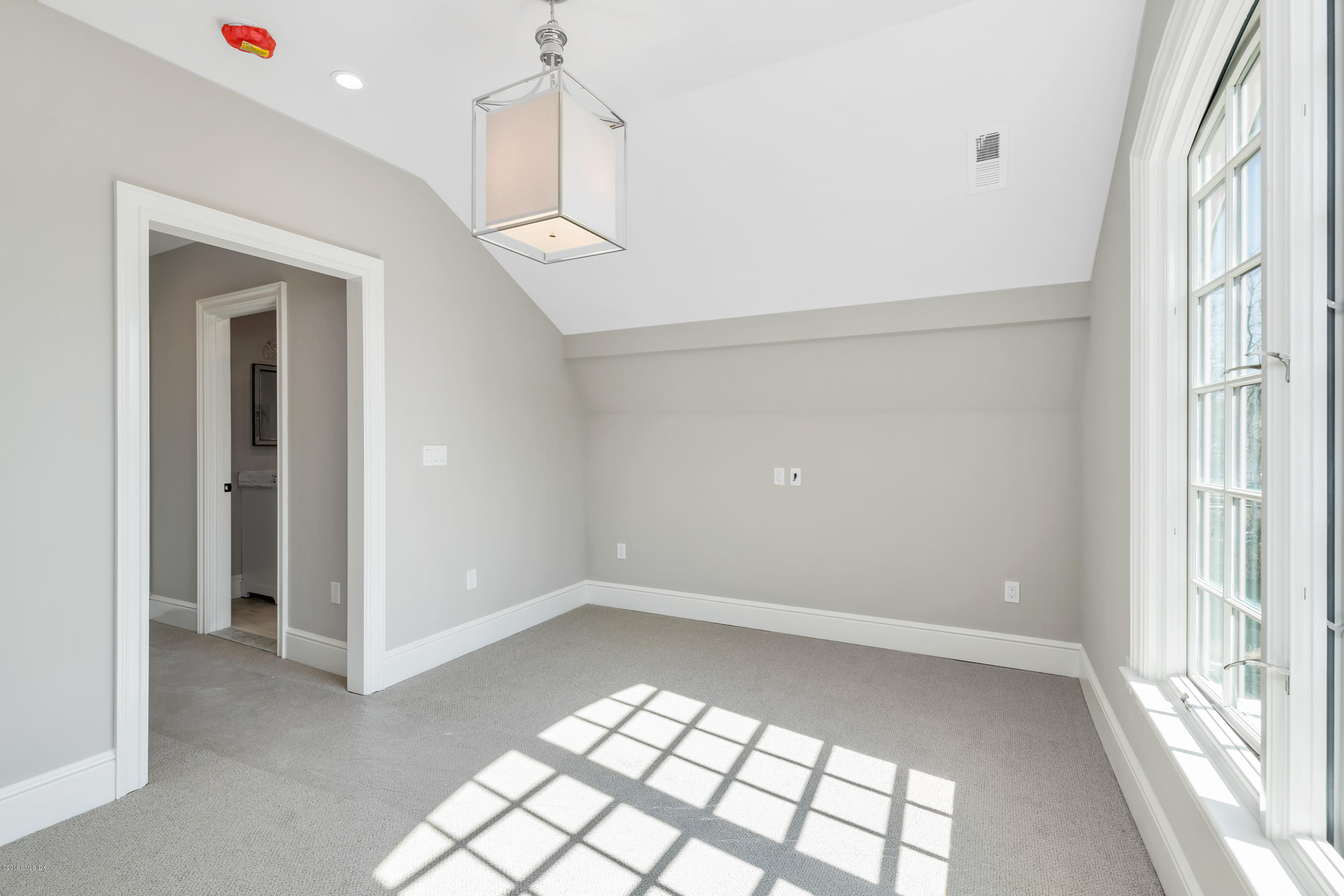 350 Riverside Avenue, Unit B Riverside, CT 06878 - Photo 13 of 15 a view of an empty room and window