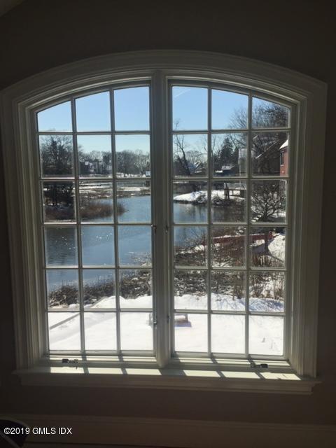 350 Riverside Avenue, Unit B Riverside, CT 06878 - Photo 14 of 15 a view of a large window with a yard