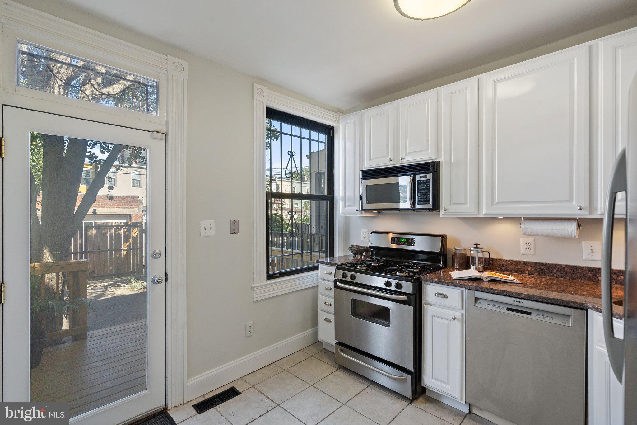 1619 Marion Street Northwest Washington, DC 20001 - Photo 16 of 41 Sunny walk-out to deck