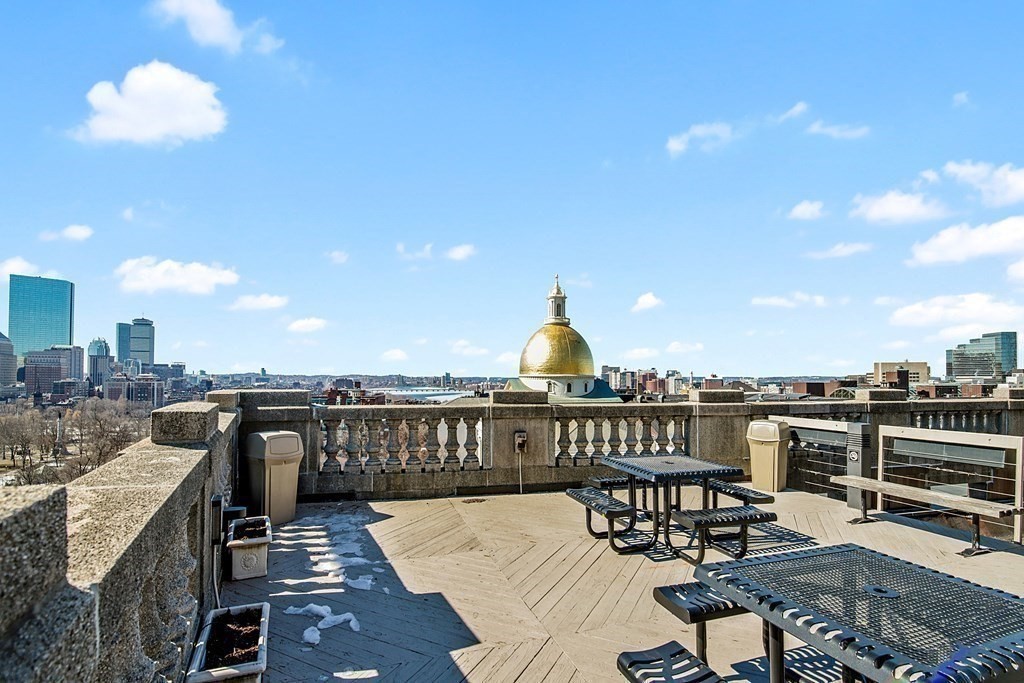 21 Beacon Street, Unit 7L Boston, MA 02108 - Photo 15 of 18 a view of a balcony with furniture