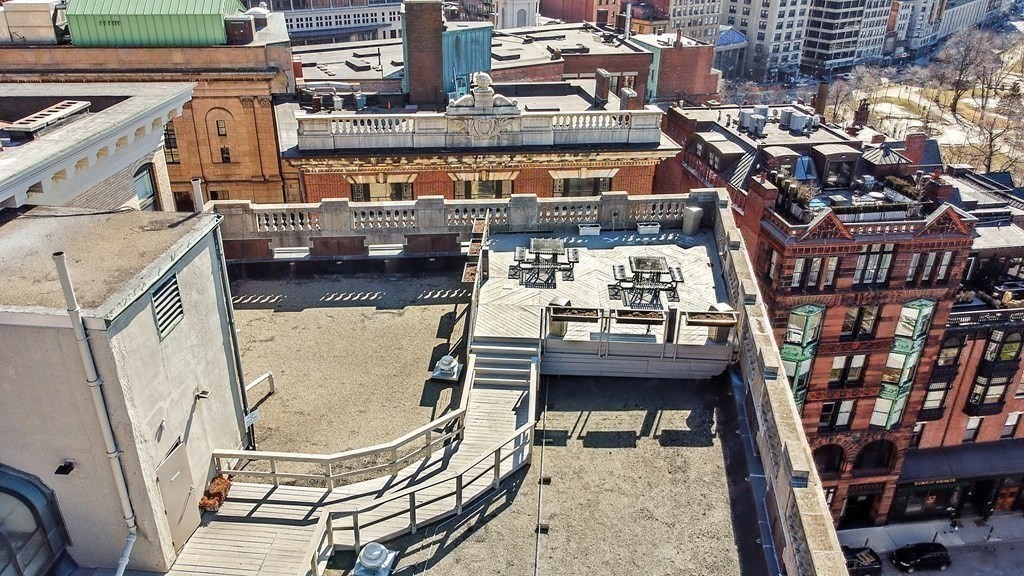 21 Beacon Street, Unit 7L Boston, MA 02108 - Photo 18 of 18 a balcony with sitting area and furniture