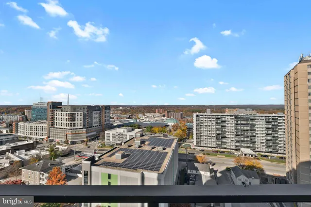 a view of city with tall buildings