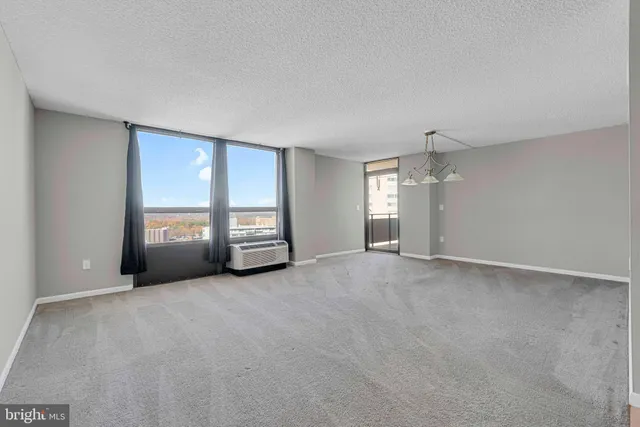 a view of a livingroom with a staircase