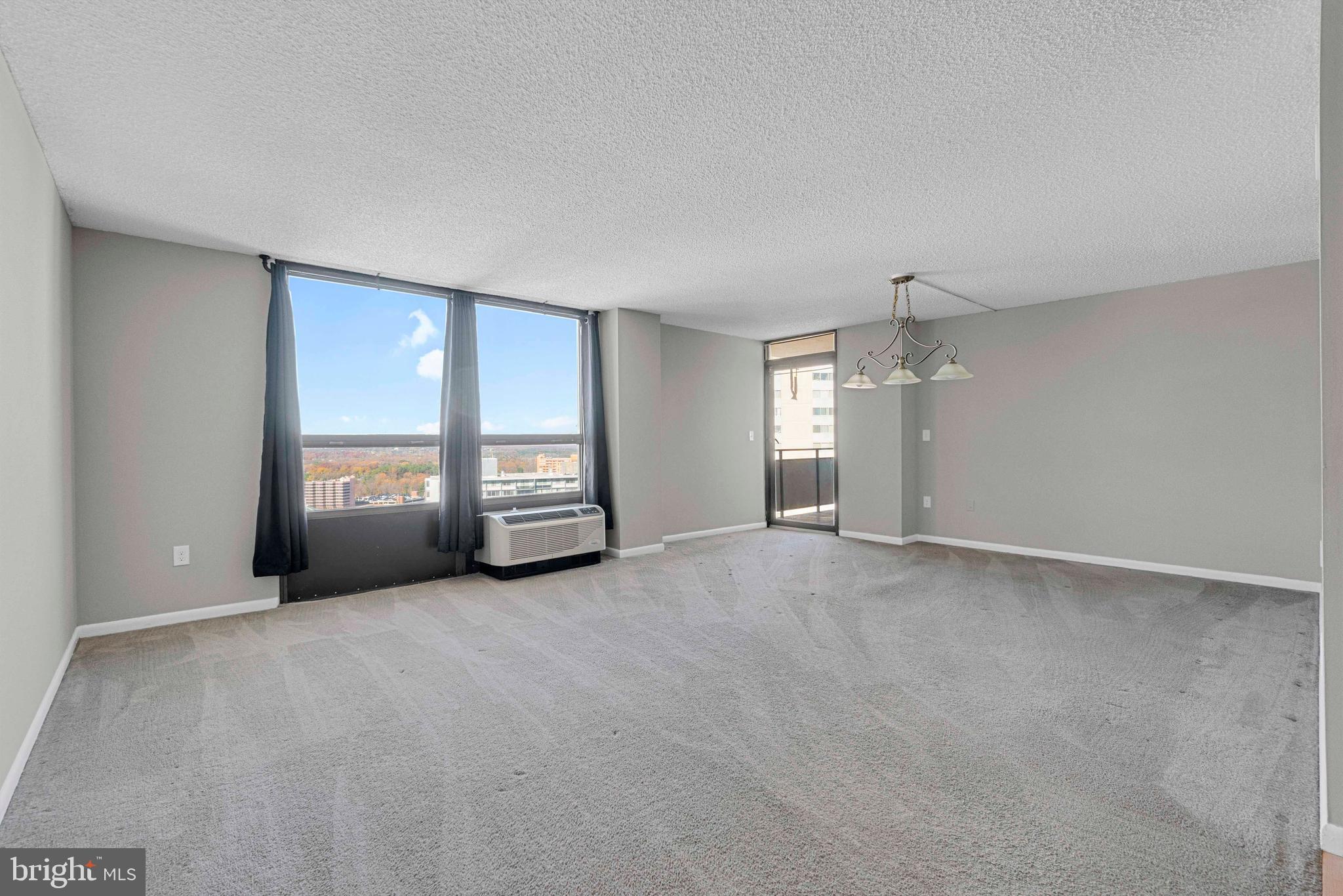 205 East Joppa Road, Unit 1902 Towson, MD 21286 - Photo 7 of 27 a view of a livingroom with a staircase