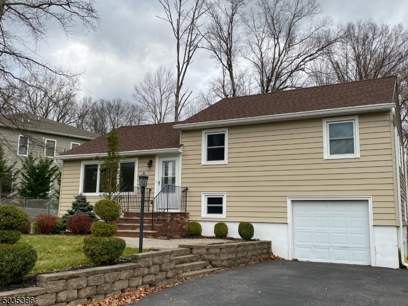 264 Malapardis Road Morris Plains, NJ 07950 - Photo 2 of 16 a view of house with a street