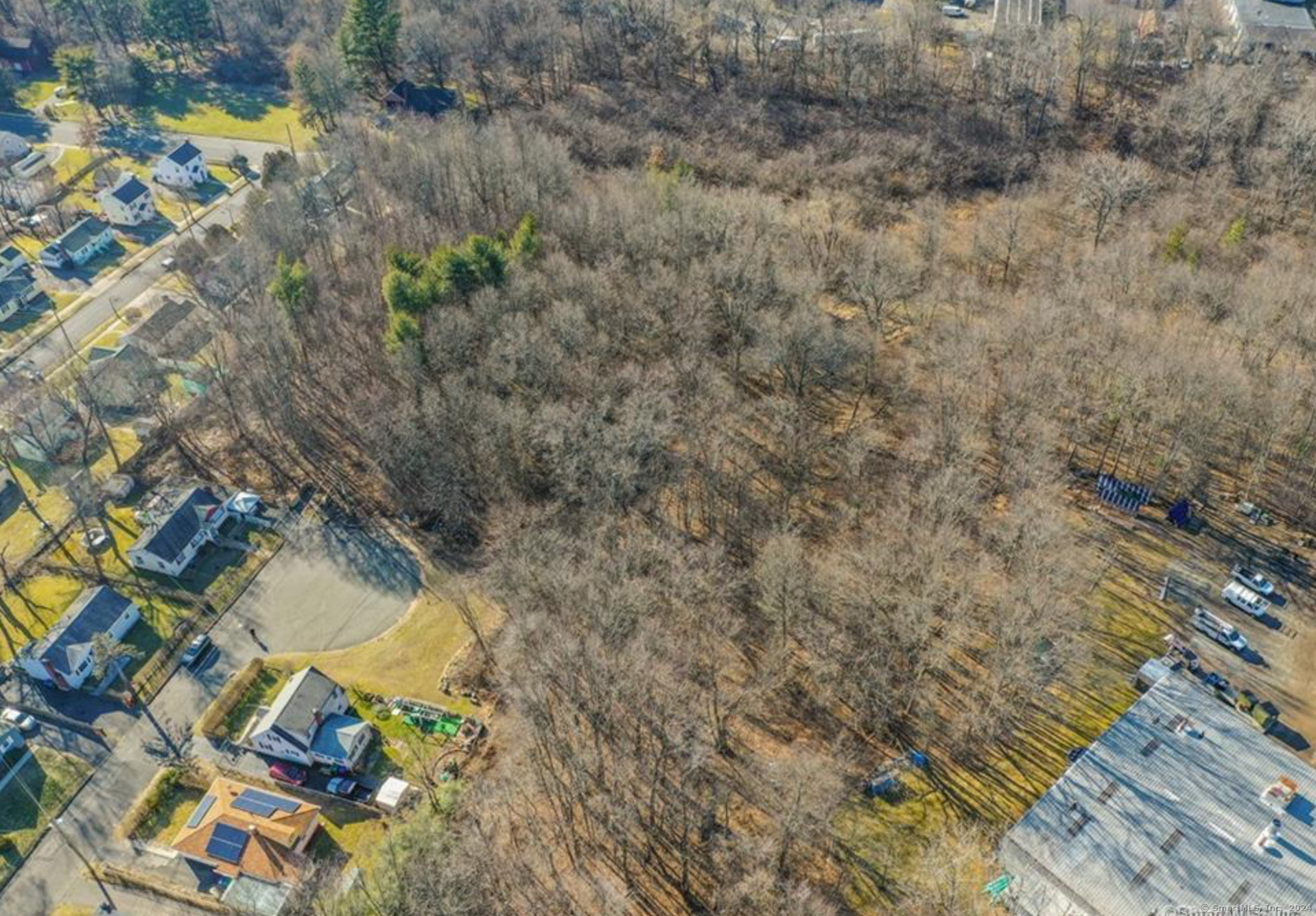 180 Brookline Avenue Bloomfield, CT 06002 - Photo 9 of 20 a aerial view of residential houses with yard