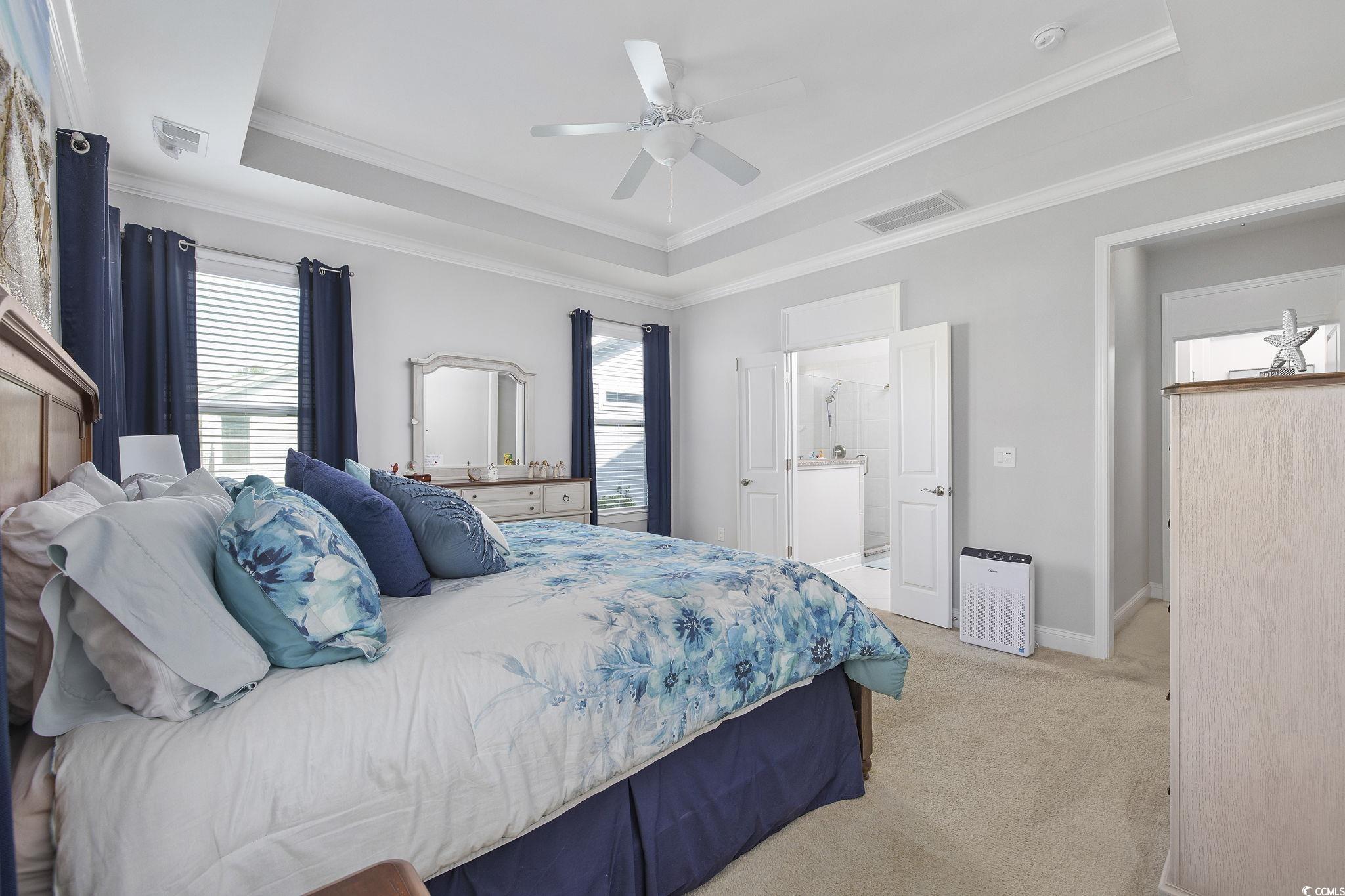 1906 Silver Spring Lane Myrtle Beach, SC 29577 - Photo 15 of 40 Bedroom with light colored carpet, ceiling fan, a