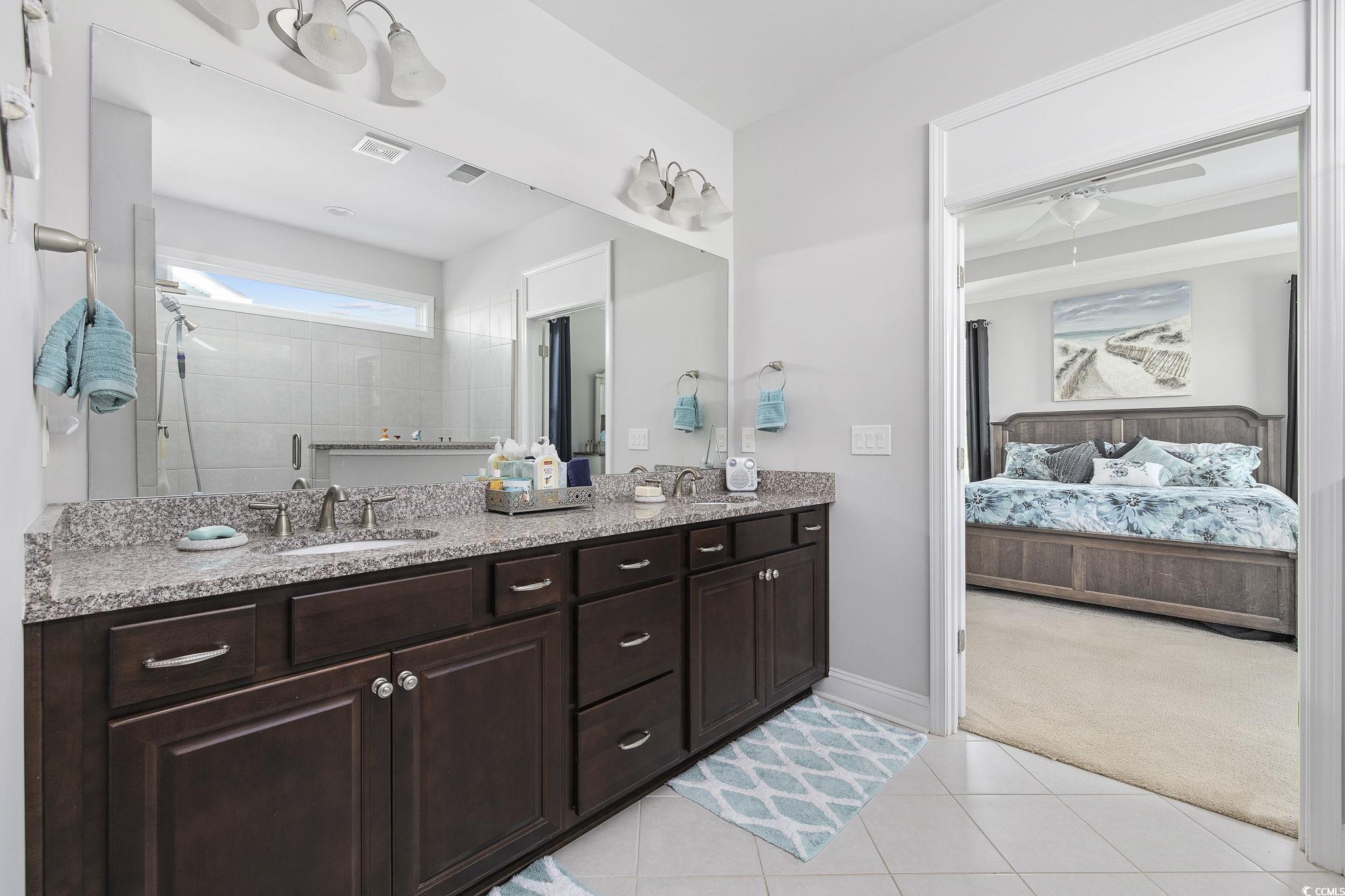 1906 Silver Spring Lane Myrtle Beach, SC 29577 - Photo 18 of 40 Bathroom with tile patterned floors, ceiling fan,