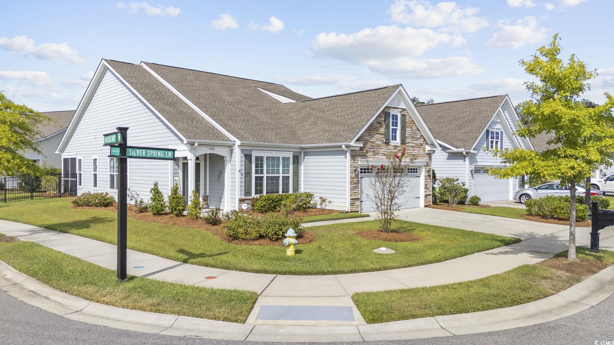 1906 Silver Spring Lane Myrtle Beach, SC 29577 - Photo 3 of 40 View of front of property featuring a front lawn a