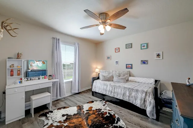 a terrace with outdoor seating and water view