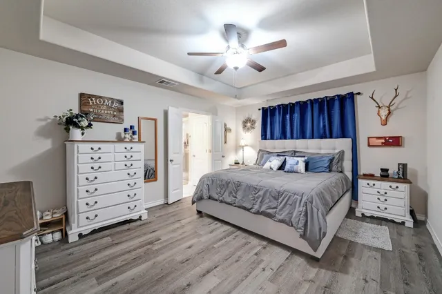 a bathroom with a granite countertop sink mirror and a