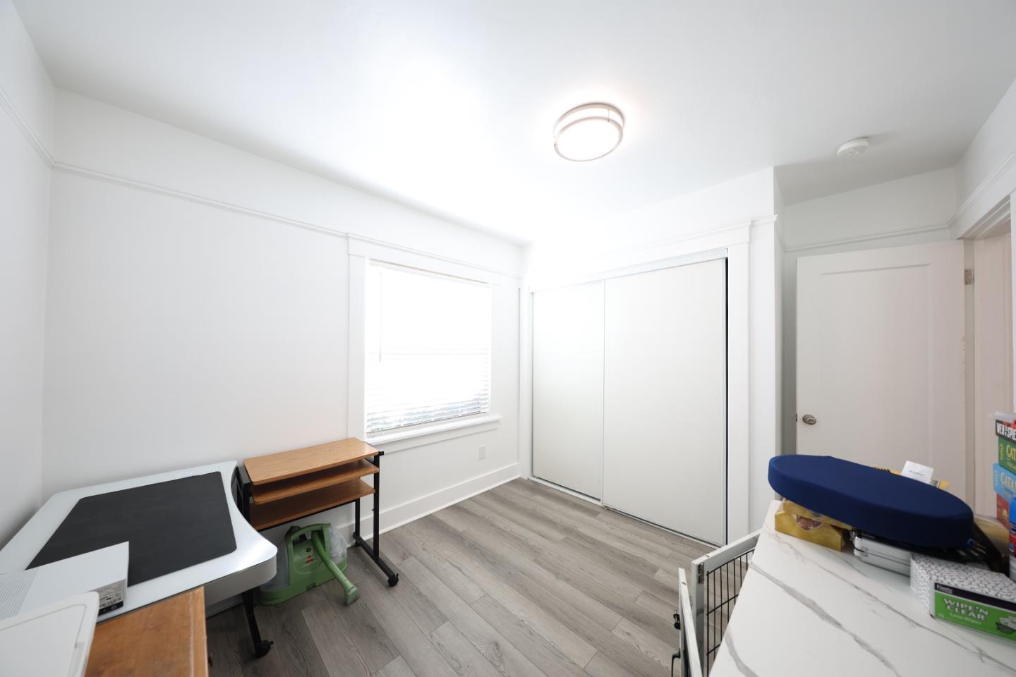 123 Chestnut Street Salinas, CA 93901 - Photo 13 of 25 a room with a bench and a workspace