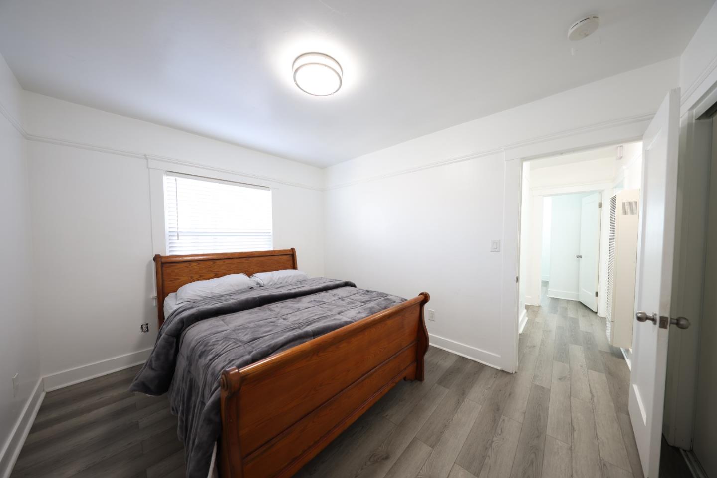 123 Chestnut Street Salinas, CA 93901 - Photo 16 of 25 a bedroom with a bed and a window