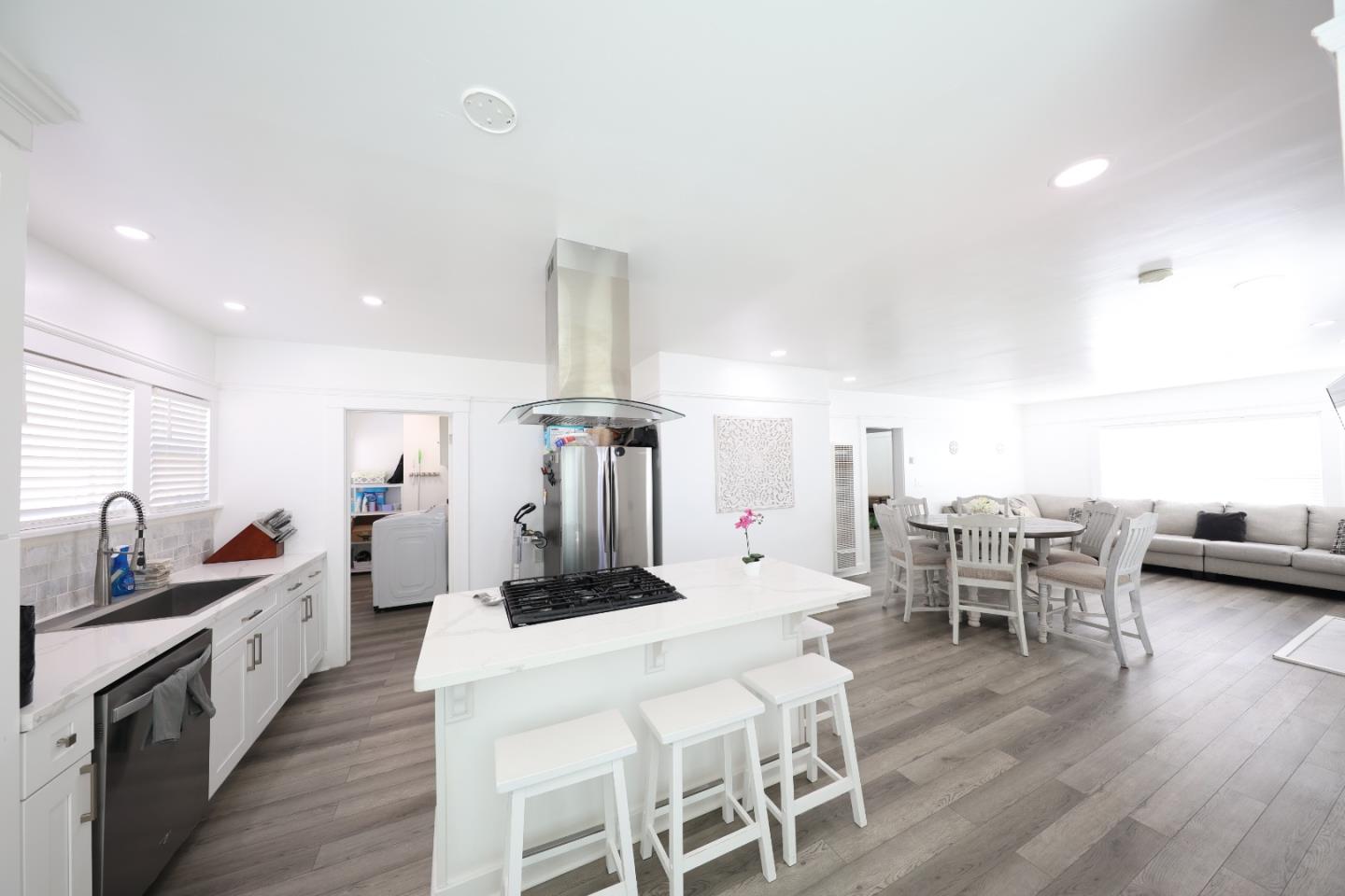 123 Chestnut Street Salinas, CA 93901 - Photo 5 of 25 a large kitchen with a table and chairs