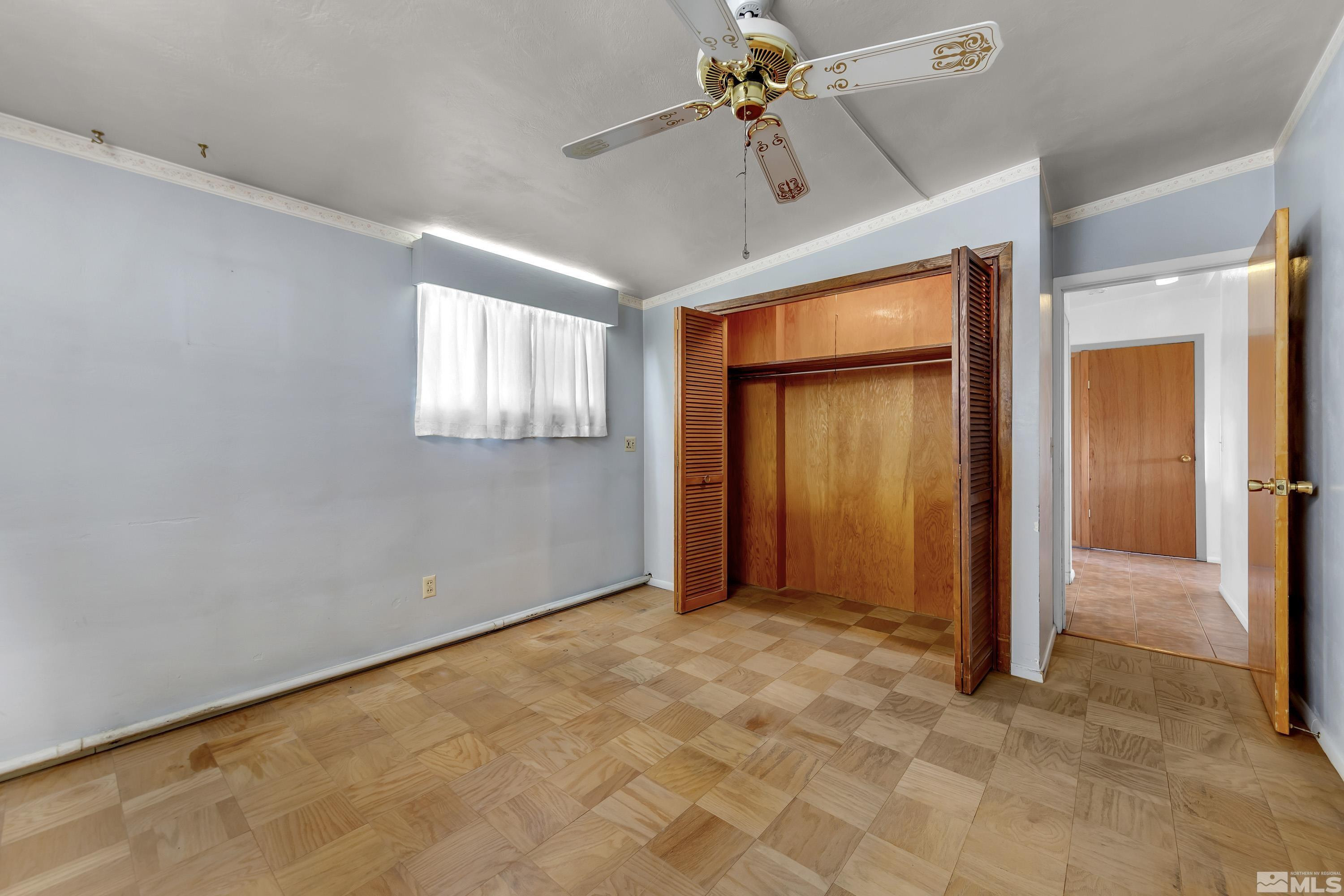 1275 Washington Street Reno, NV 89503 - Photo 15 of 37 an empty room with windows and closet