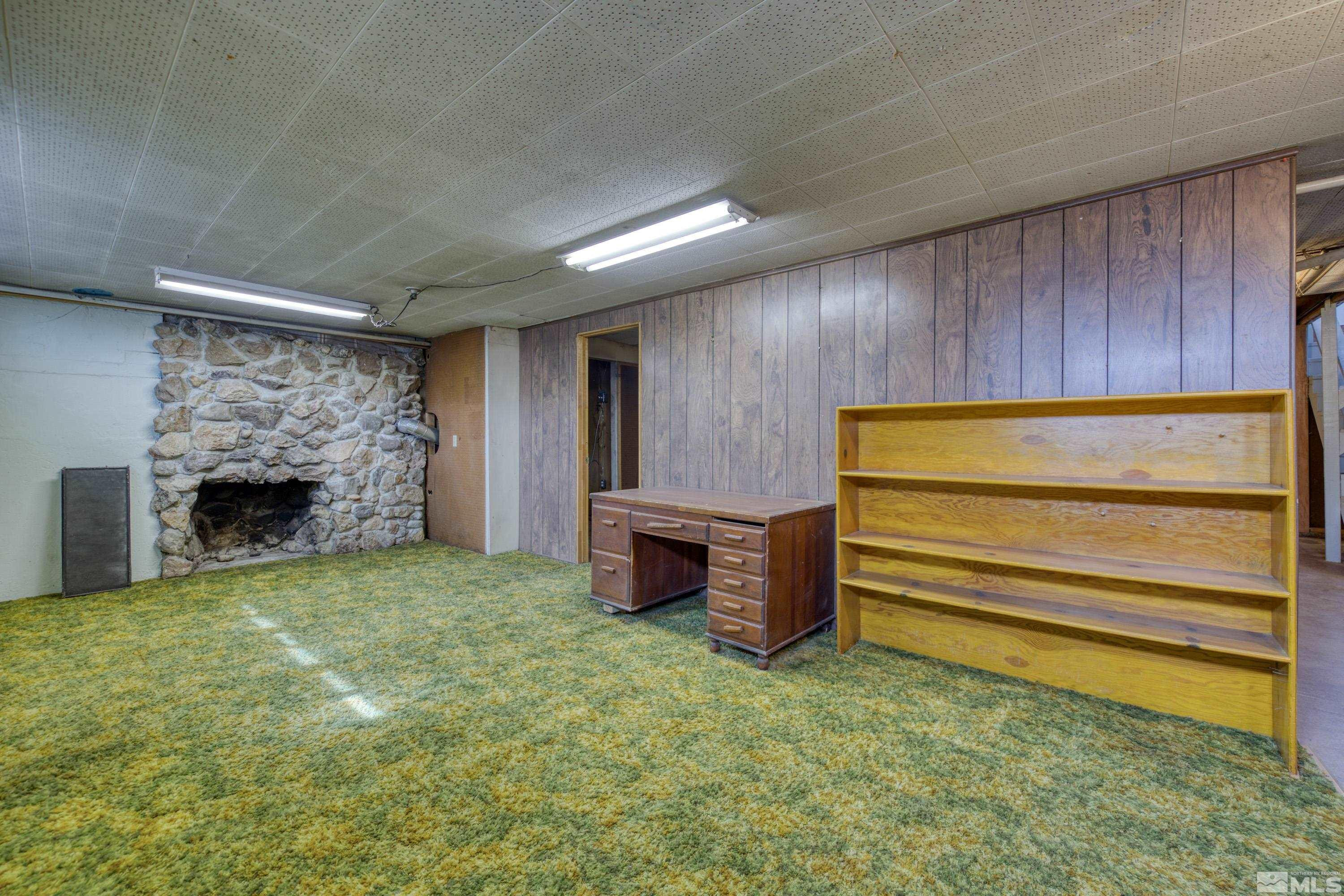 1275 Washington Street Reno, NV 89503 - Photo 23 of 37 a view of an empty room with fire place and a fireplace