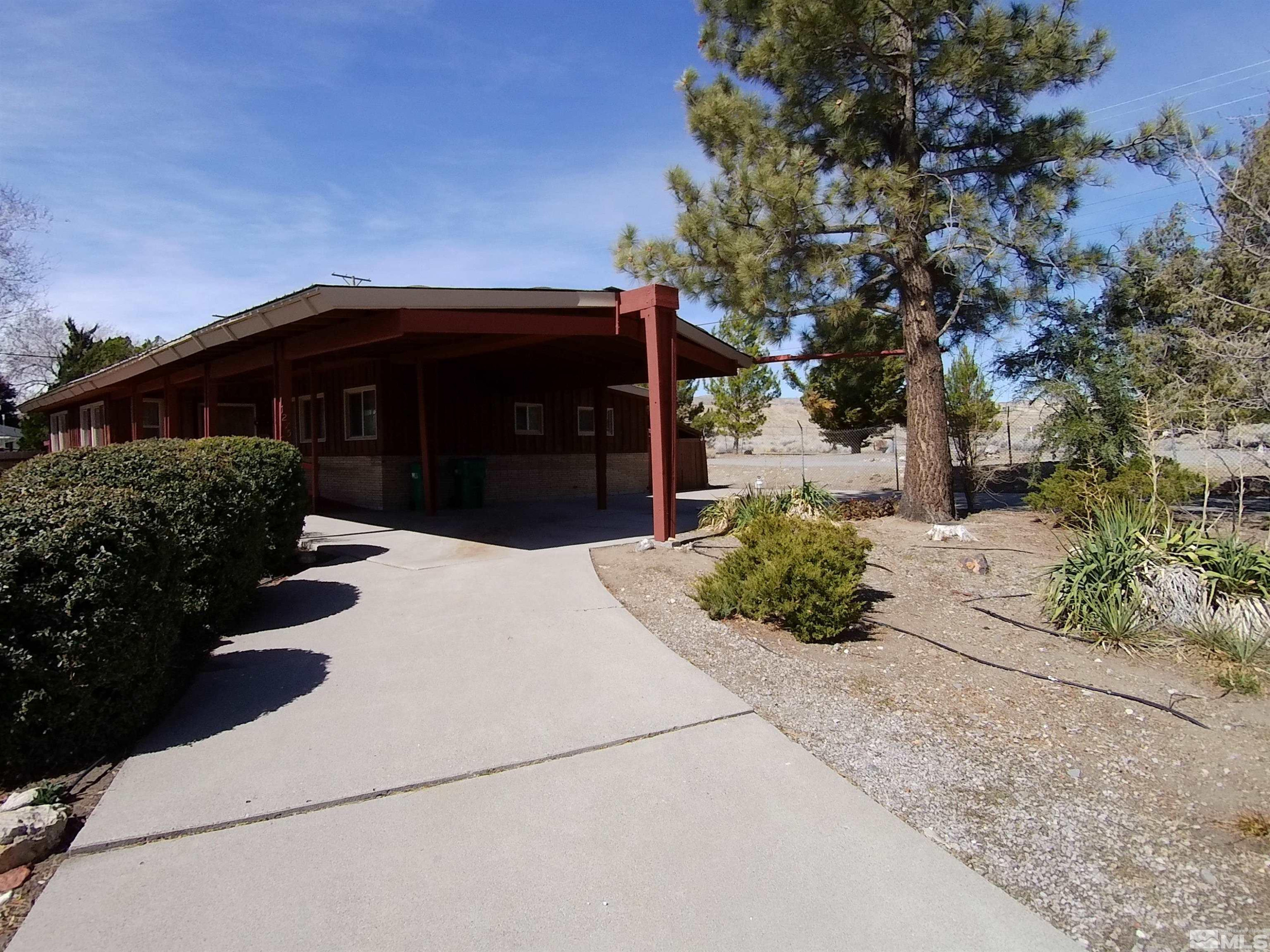 1275 Washington Street Reno, NV 89503 - Photo 3 of 37 a front view of a house with garden