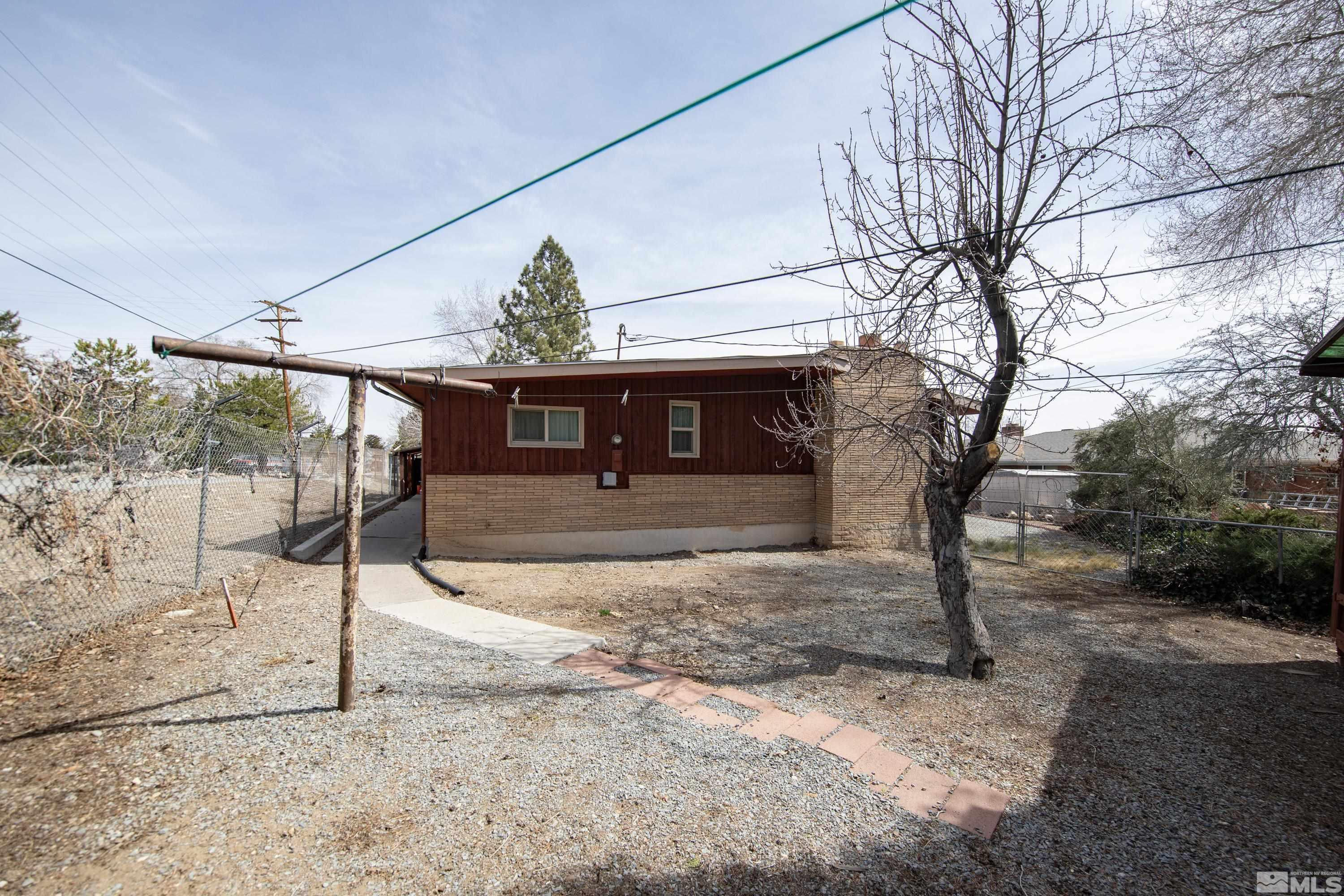1275 Washington Street Reno, NV 89503 - Photo 33 of 37 a front view of a house with a yard