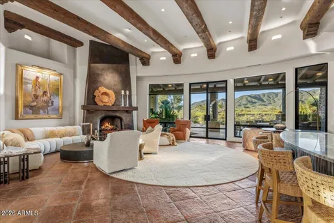 a kitchen with stainless steel appliances granite countertop a stove and cabinets
