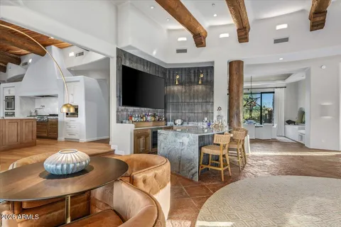 a kitchen with stainless steel appliances granite countertop a sink and cabinets