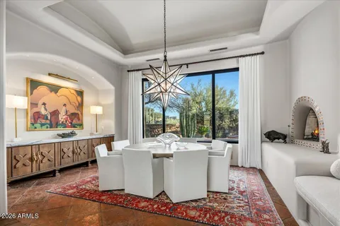 a view of a livingroom with furniture and window