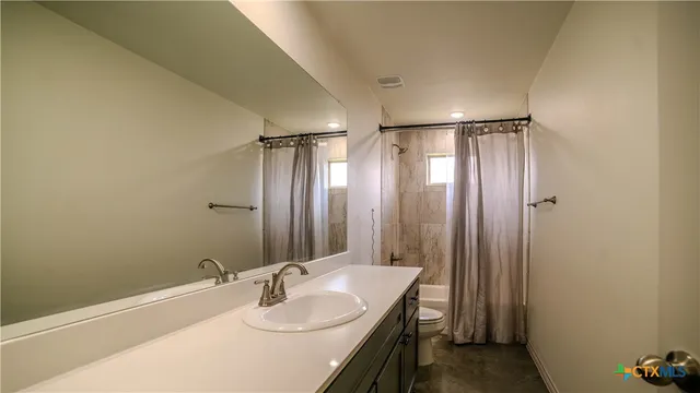 a storage room with a bathtub