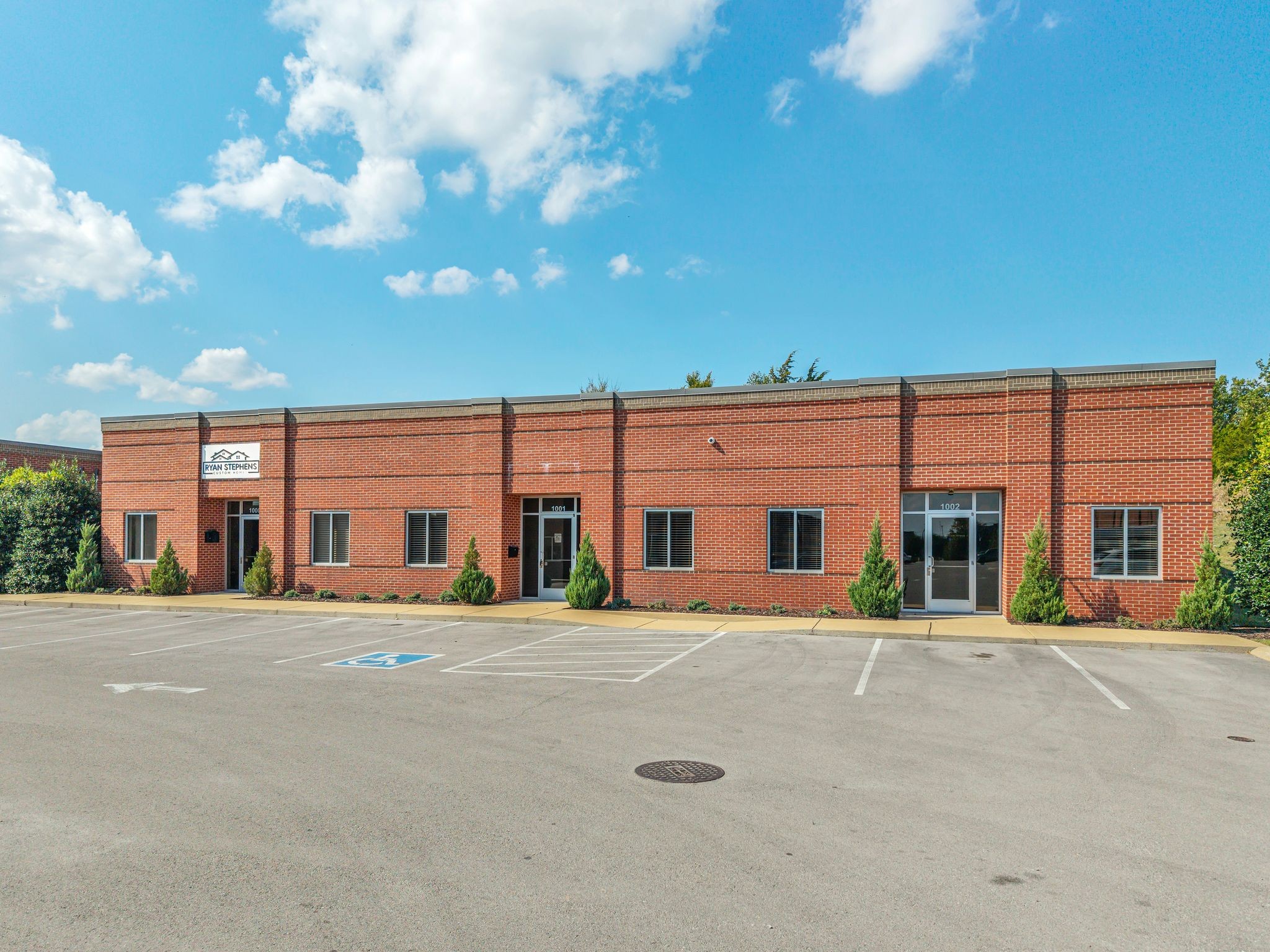 1633 West Main Street Lebanon, TN 37087 - Photo 3 of 36 a front view of a building with many windows