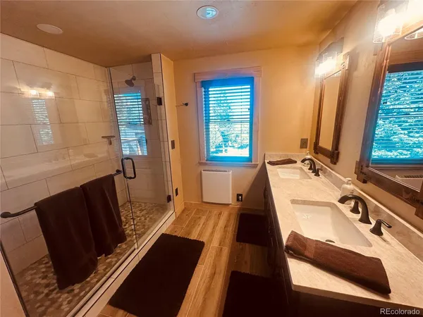 a view of entryway with wooden floor