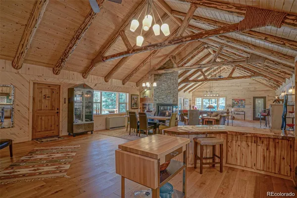 a kitchen with stainless steel appliances granite countertop a sink and cabinets