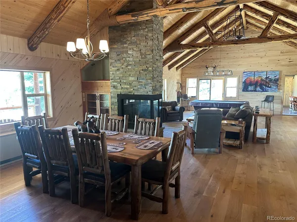 a dining room with furniture and window