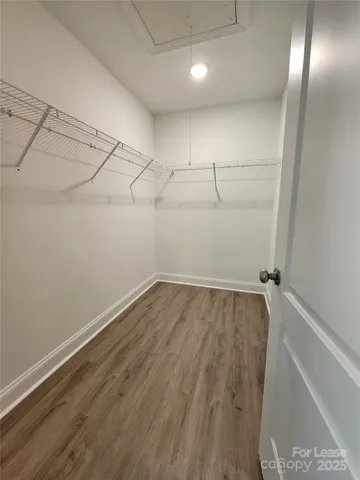 a view of a room with racks on the wall