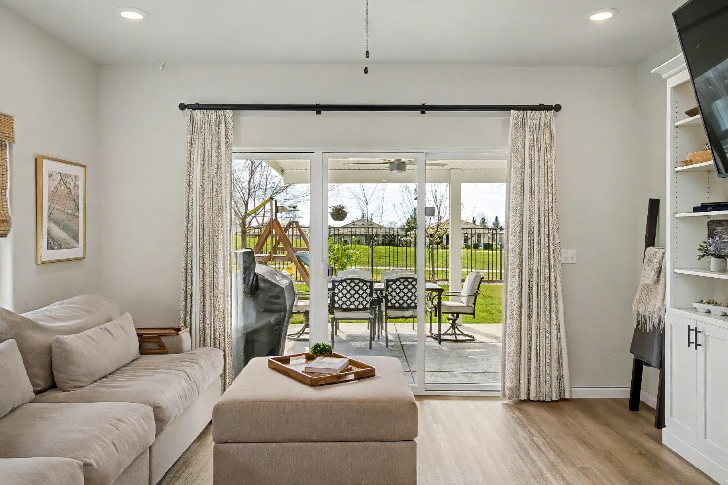 1502 Braeburn Way Ione, CA 95640 - Photo 14 of 48 a living room with furniture and a large window