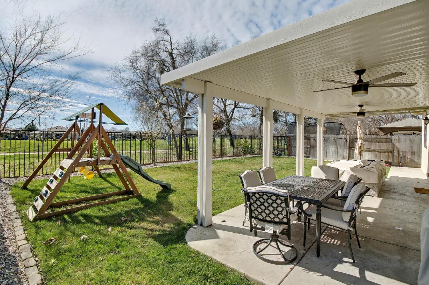 1502 Braeburn Way Ione, CA 95640 - Photo 39 of 48 a view of a house with backyard porch and sitting area