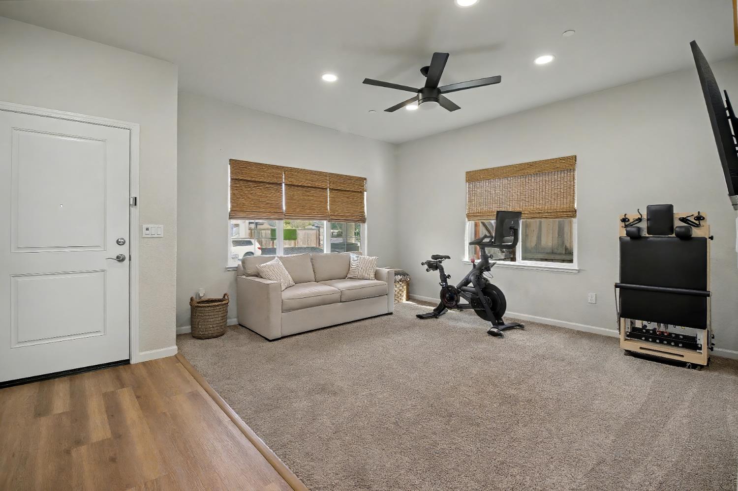 1502 Braeburn Way Ione, CA 95640 - Photo 6 of 48 a living room with furniture and a flat screen tv
