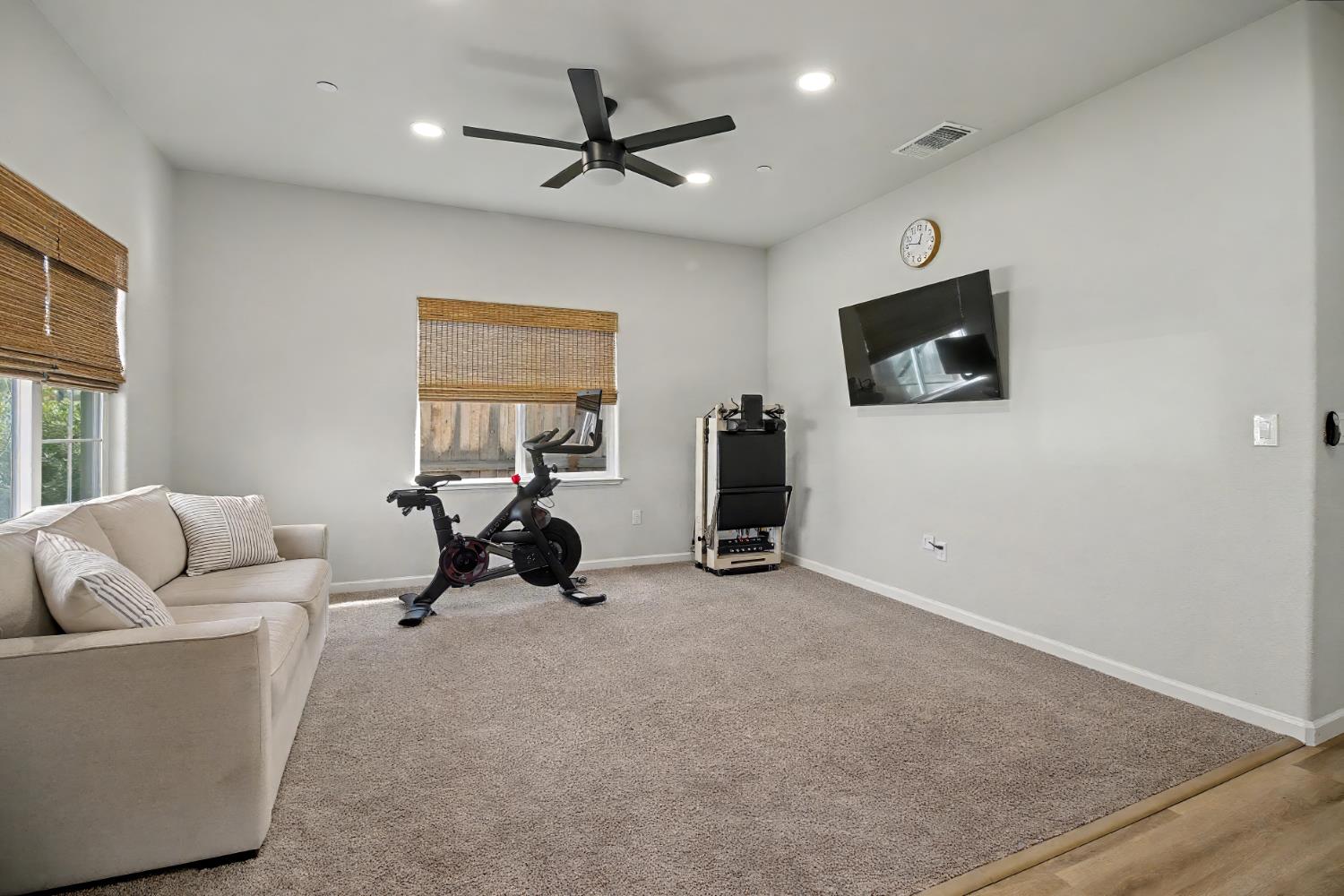 1502 Braeburn Way Ione, CA 95640 - Photo 7 of 48 a living room with furniture and a flat screen tv