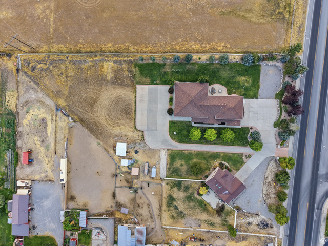 702 Alpine Highway Alpine, UT 84004 - Photo 13 of 83 Aerial perspective showcasing a primary residence with a detached auxiliary building
