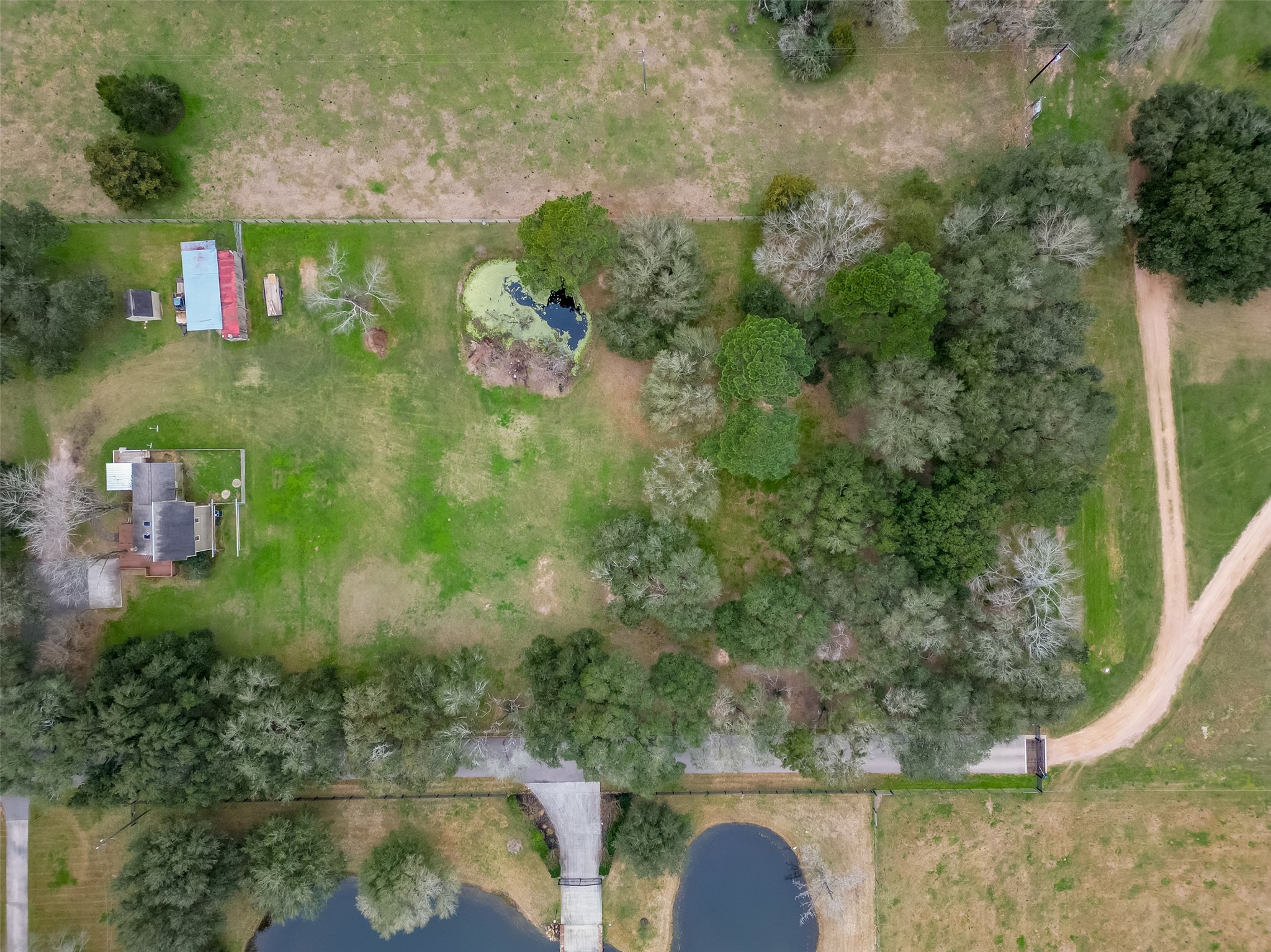 12122 Zion Road Tomball, TX 77375 - Photo 26 of 35 an aerial view of residential house with outdoor space