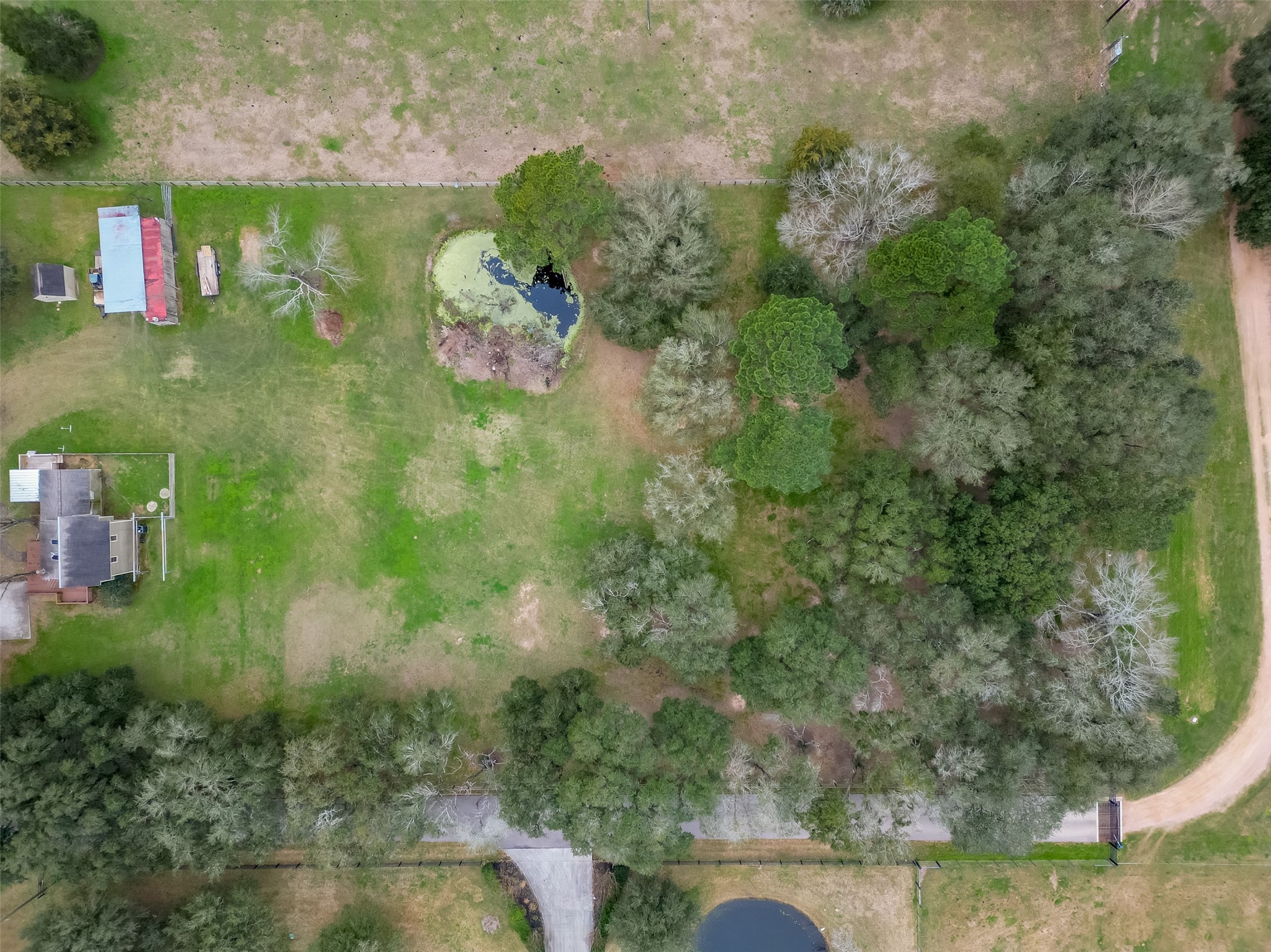12122 Zion Road Tomball, TX 77375 - Photo 27 of 35 a view of swimming pool from a lake view