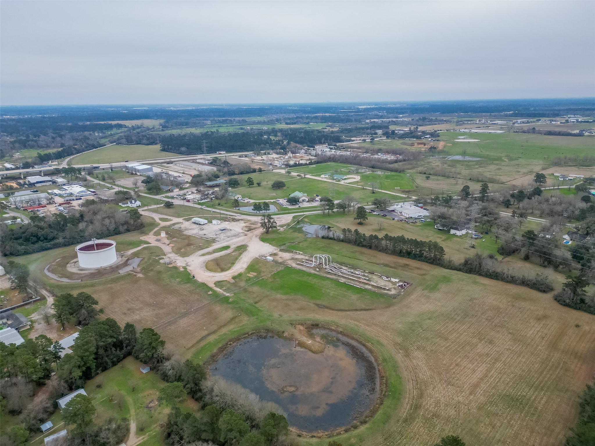12122 Zion Road Tomball, TX 77375 - Photo 30 of 35 an aerial view of residential houses with outdoor space