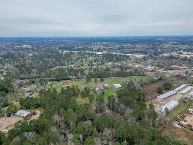 an aerial view of residential house and lake view