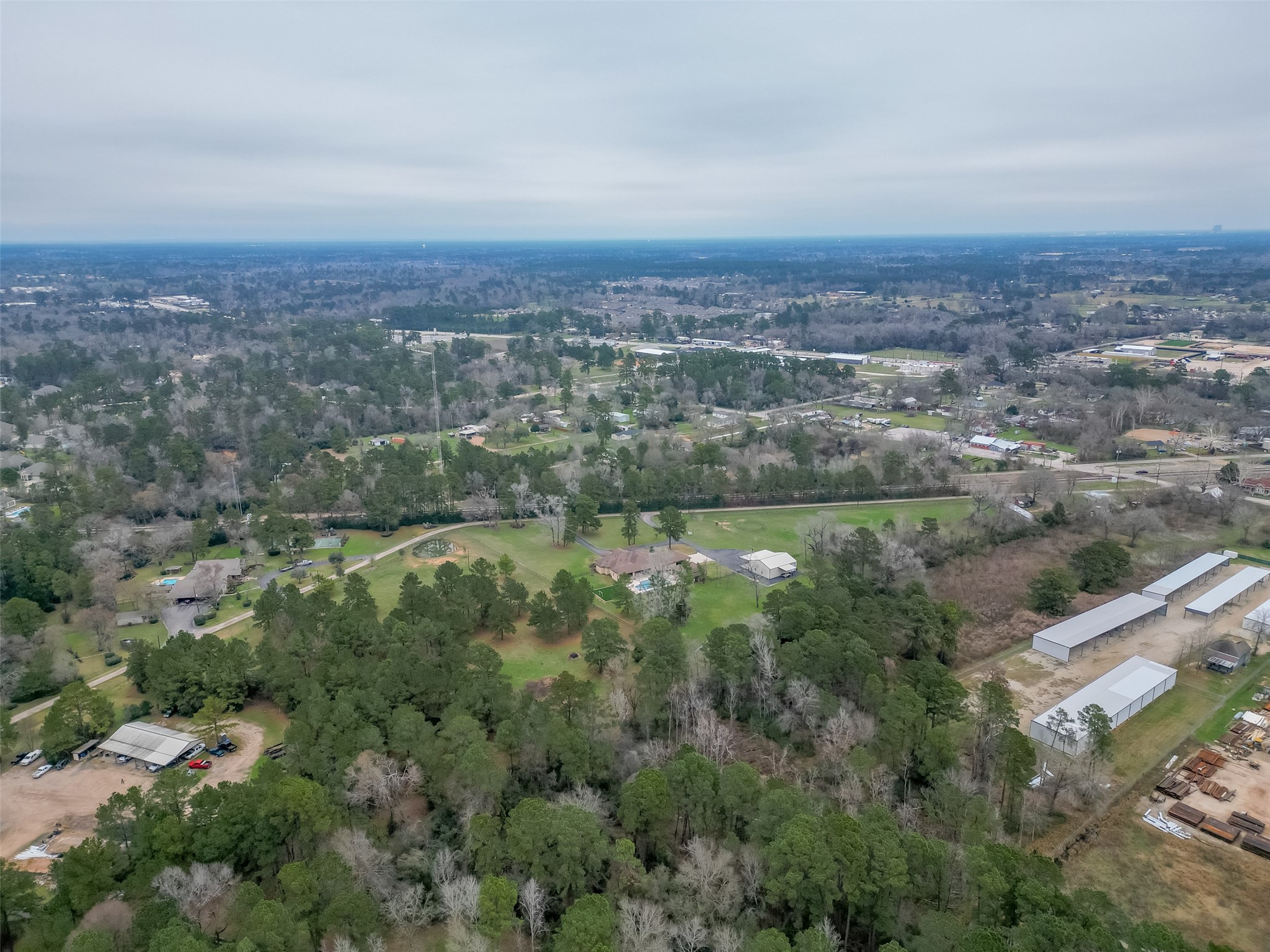 12122 Zion Road Tomball, TX 77375 - Photo 33 of 35 an aerial view of residential building and green space