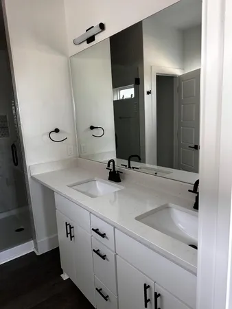 a bathroom with a sink and a mirror