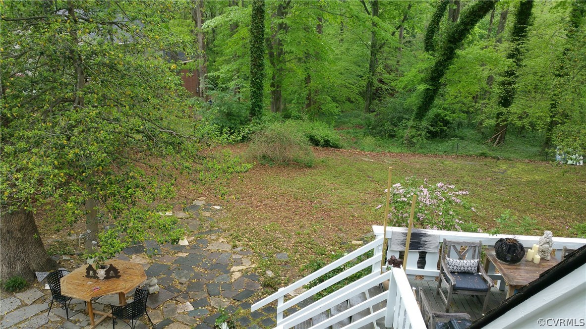 4030 Collingbourne Road Richmond, VA 23235 - Photo 26 of 27 a view of a two chairs and table on the patio