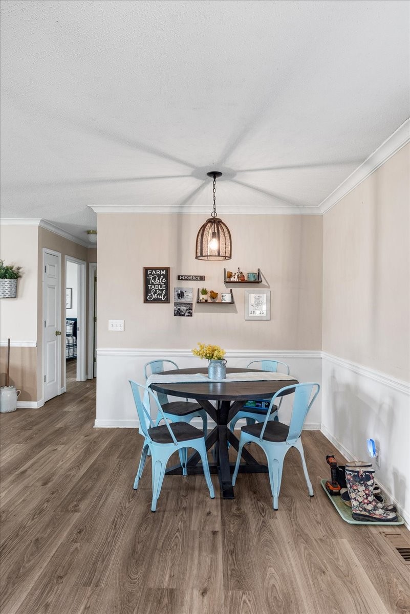 1505 Longview Road Unionville, TN 37180 - Photo 14 of 24 a view of a dining room with furniture and wooden floor