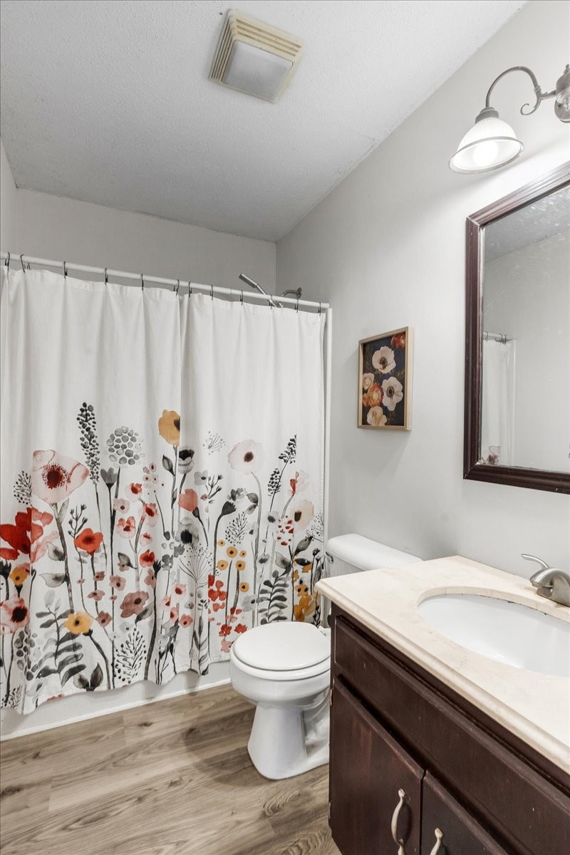 1505 Longview Road Unionville, TN 37180 - Photo 18 of 24 a bathroom with a sink toilet and shower