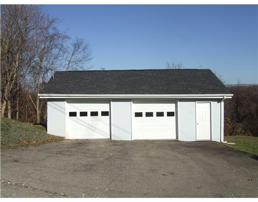 313 Moffit Road Dilliner, PA 15327 - Photo 3 of 12 Exterior Front. Garage