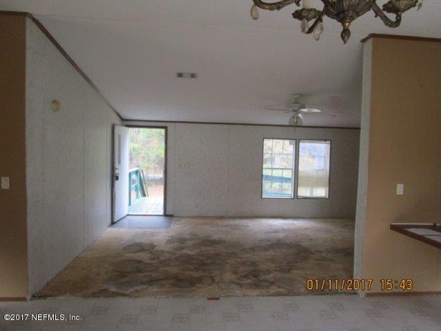 45072 Bismark Road Callahan, FL 32011 - Photo 17 of 39 an empty room with windows
